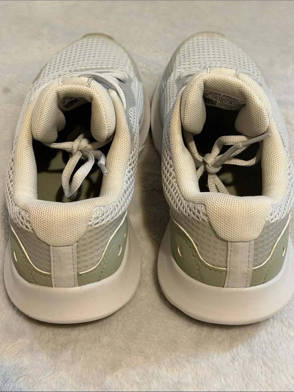 Under Armour woman’s Surge Running Sneakers — Light gray